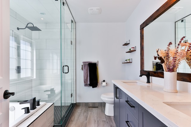 A sophisticated bathroom displaying a clear glass shower door and a refined sink